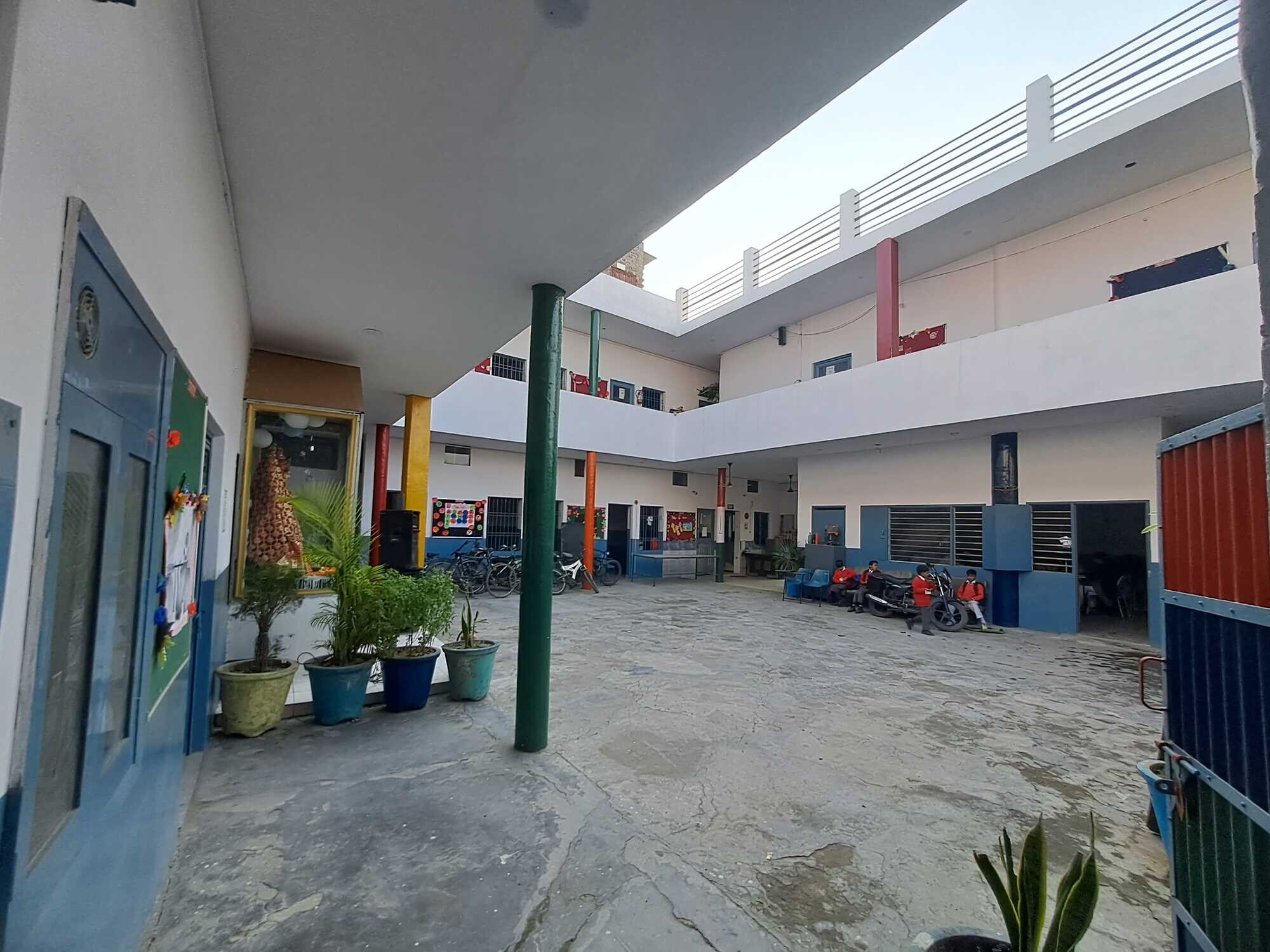 The central courtyard and classroom blocks at Uttam Public School